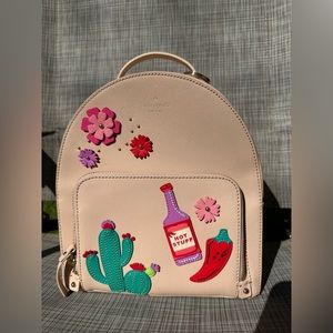 KATE SPADE BACKPACK CUTE FLOWERS WITH HOT SAUCE. RARE